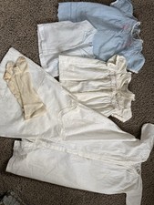 collection of vintage baby/doll clothes