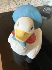 Vintage ceramic duck with blue bonnet.  6 inches tall.