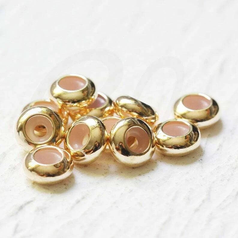 10 Piezas Tono Dorado - Cuentas Tapón - Tapón con Goma Interior 8x4mm (CW-4250C) Foto 2 de 2