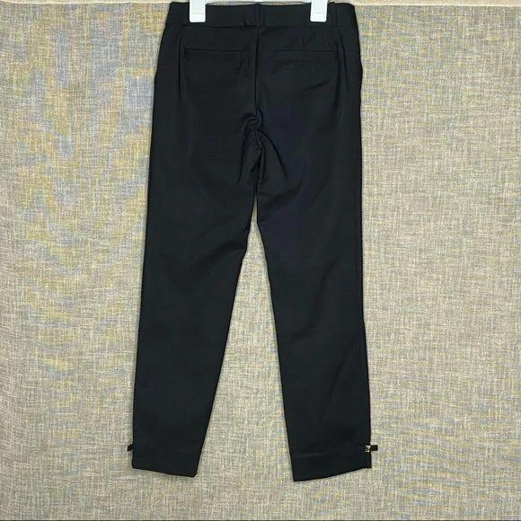 Abito Kate Spade Jackie pantaloni fiocco polsino borchie oro nero tagliato Capri taglia 00