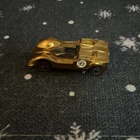 Hot Wheels Redlines McLaren M6A Redline Wheels Gold 1:64 Diecast Car #99