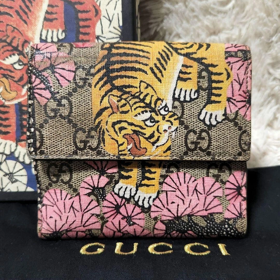 Pochette zippée Gucci GG Supreme monogramme Bengale beige rose