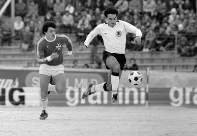 German midfielder Hansi Muller is being chased by a Maltese oppone- Old Photo