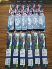 lot of 12 Oral-B 3D White Vivid Whitening Manual Toothbrushes Medium Bristles