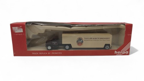 TAYLOR & BATES BREWERY, ELORA BEER, INTERNATIONAL, SEMI TRACTOR TRAILER by Herpa - Picture 20 of 22
