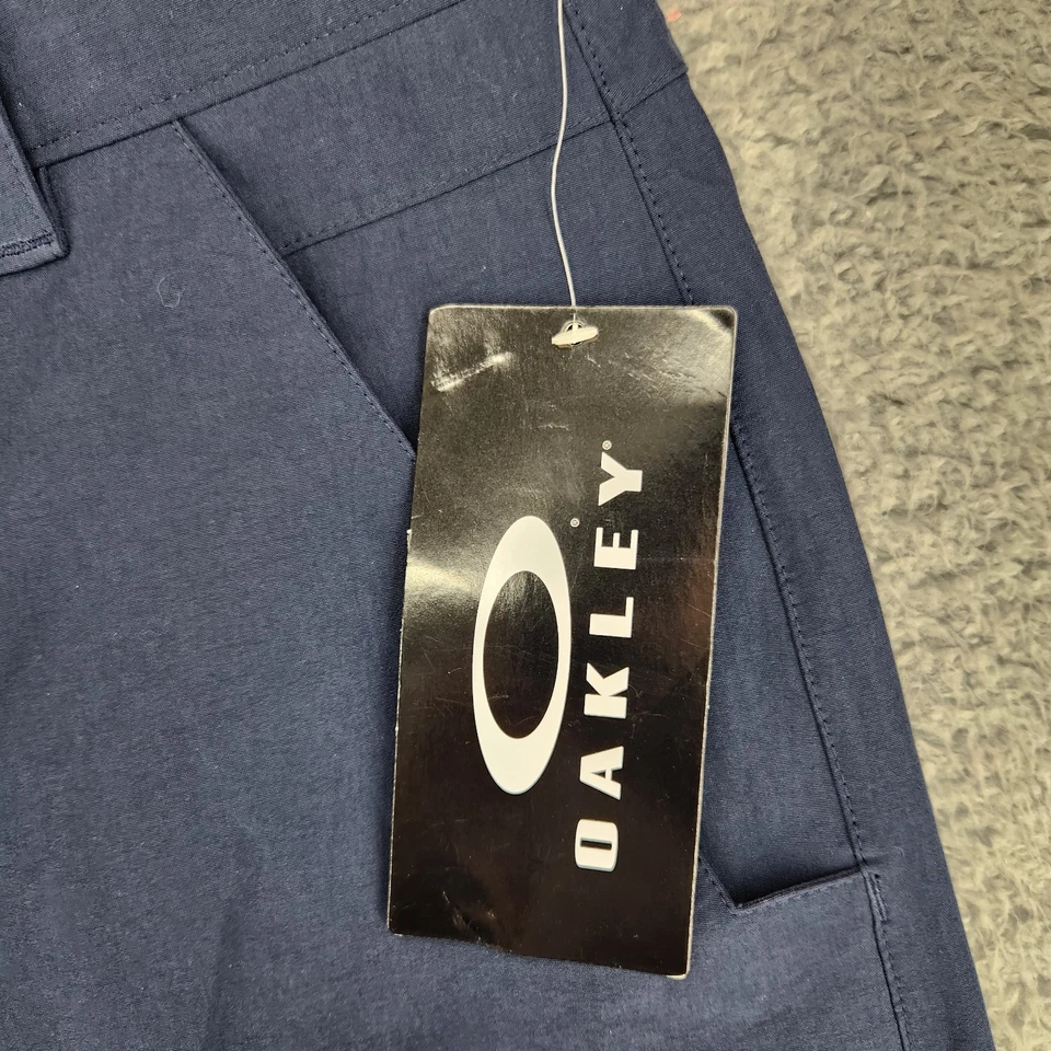 Pantalones cortos de golf Oakley Take Short 2.5 para hombre 38 chinos azules Foto 2 de 4