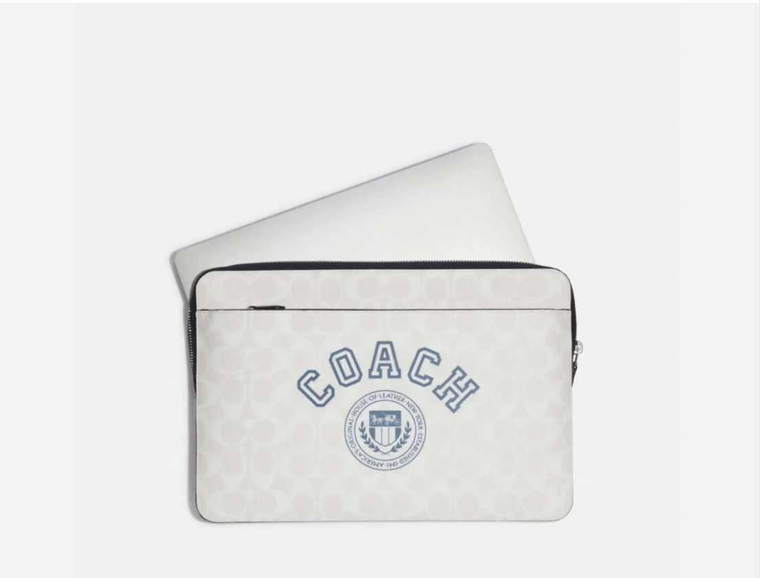 laptop sleeve in signature canvas with coach varsity