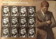 A sheet  of 12 Kennedy collectors' stamps.