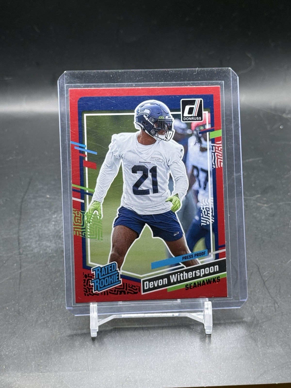 2023 Panini Donruss Football Rated Rookie Red Press Proof #389 Devon Witherspoon