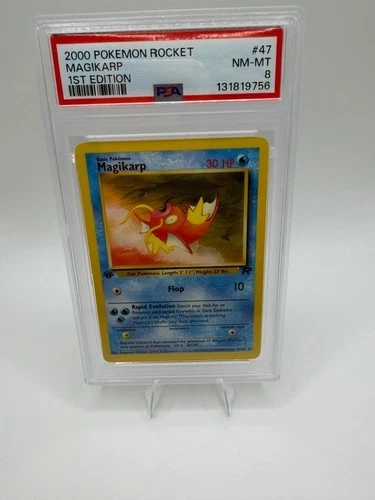 Pokémon 2000 Team Rocket Magikarp 1st Edition PSA 8 47/82 English