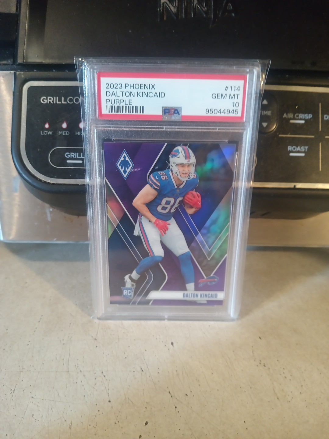 2023 Panini Phoenix - Rookies Dalton Kincaid #114 Purple /125 (RC) Bills PSA 10