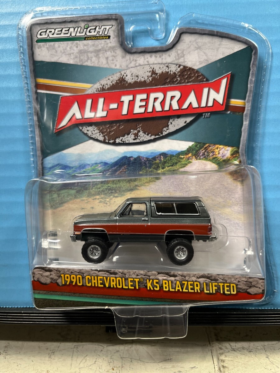 1/64 GREENLIGHT ALL TERRAIN 1990 CHEVROLET K5 BLAZER LIFTED GRAY
