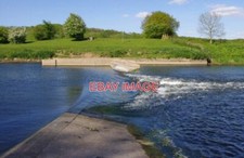 PHOTO  WEIR ON THE RIVER RIBBLE LOW FLOW AFTER A DRY AND SUNNY APRIL.
