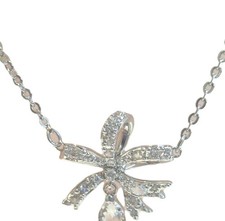 SWAROVSKI silver tone crystal bow hyperbola necklace, BNIB, RRP £120