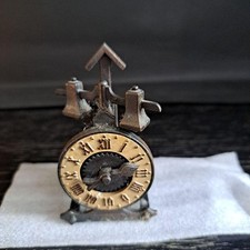 Copper Spanish engraved clockshaped old pencil sharpener used