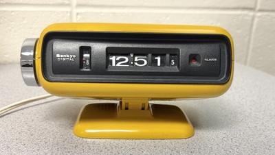 Sankyo drum/roller clock Model 101, space age yellow, 1970s era for parts/repair