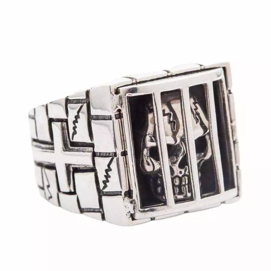 Anelli con teschio prigioniero in argento sterling - Immagine 2 di 4