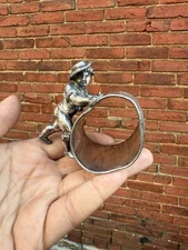 ANTIQUE AMERICAN SILVER PLATE PLATED NAPKIN RING BOY PUSHING WHEEL