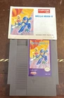 Mega Man 4 NES Game with Manual and Sleeve and clear Nintendo case.
