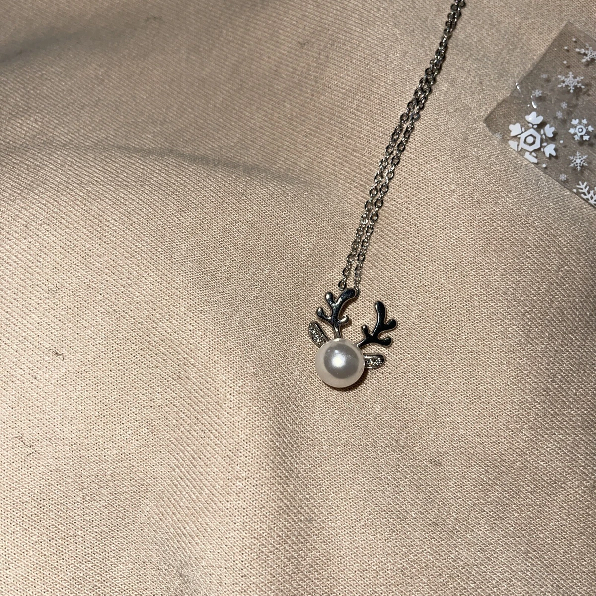 Swarovski reindeer best sale necklace