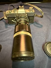 Vintage Minolta SRT102 with Minolta 1:35 200mm zoom lens Film Camera