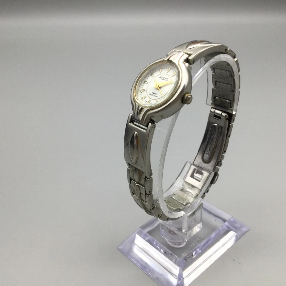 Reloj Nexus Vintage Mujer 24mm Tono Plateado Esfera Redonda Batería Nueva 7.25" Foto 4 de 4