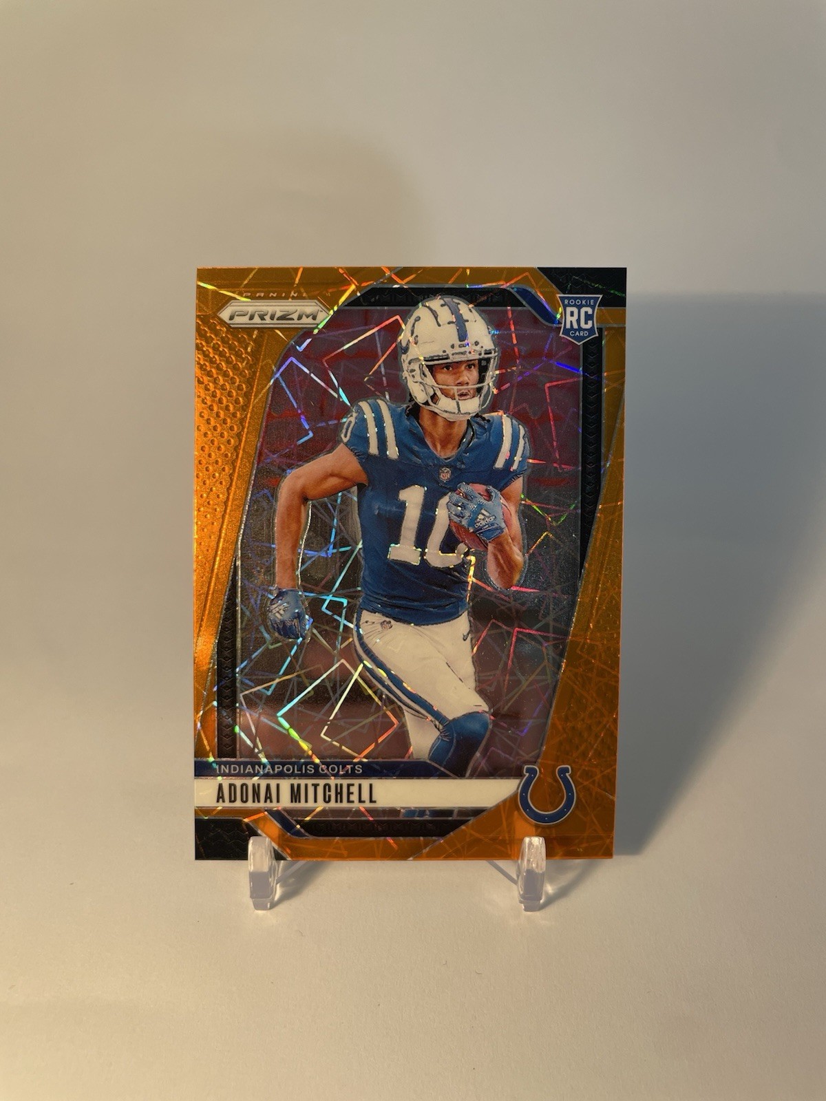 2024 Panini Prizm - Rookies Adonai Mitchell #303 Orange Lazer Prizm (RC)