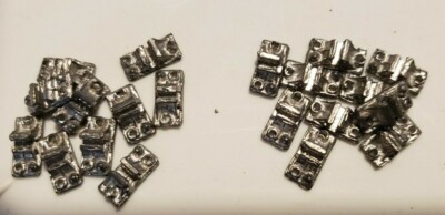 Lot of 330 Gn18 (?) Scale Rail Tie Plates with Track holder, 2 spike holes, NEW