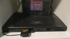 ​Ultimate SNK Neo Geo AES Bundle - Low Serial, NeoSD PRO, UniBIOS, SCART & YPbPr