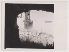 Ruins Through the Cave's Eye Vintage Silhouette of Ancient Stone Fortress Photo