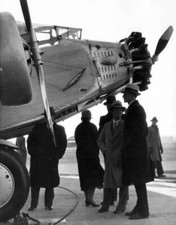 Crowd gathers near the nose of a propeller airplane New York 1930 Old Photo