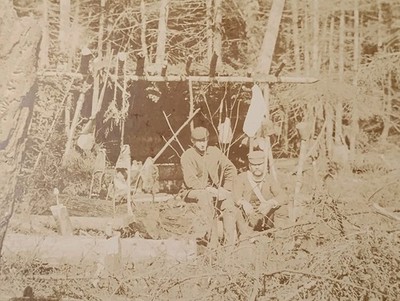 Antique Photo Men In The Woods At Camp With Makeshift Hut On Board 