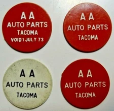 Four (4) 1970s Plastic Wooden Nickels from AA Auto Parts Tacoma Washington 