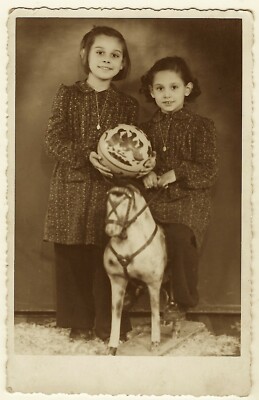 TWO ADORABLE YOUNG GIRLS AND THEIR TOYS (BULGARIA)