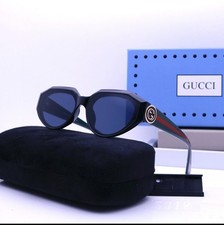 Gucci Black Cat-Eye Sunglasses with Gold Logo Detail