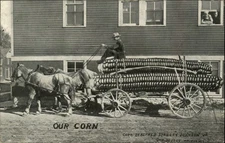 Surreal corn exaggeration Alfred Stanley Johnson wagon farmer vintage postcard