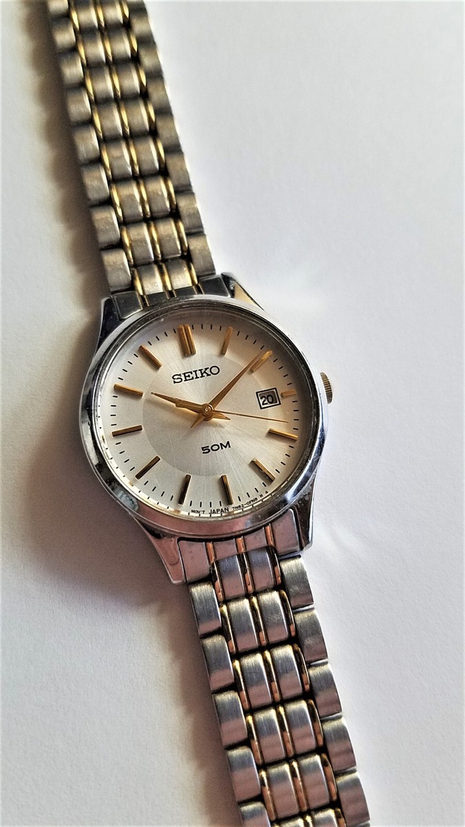 Seiko Womens 7N82-0GH0 Watch Silver & Gold Bracelet Band