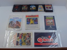 Atari 2600 Lot of 10 w Manuals QBert Fire Fighter Phoenix Millipede TESTED RP-