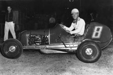 Bullet Joe Garson poses one Outboard Midget racecars Garson raced - Old Photo