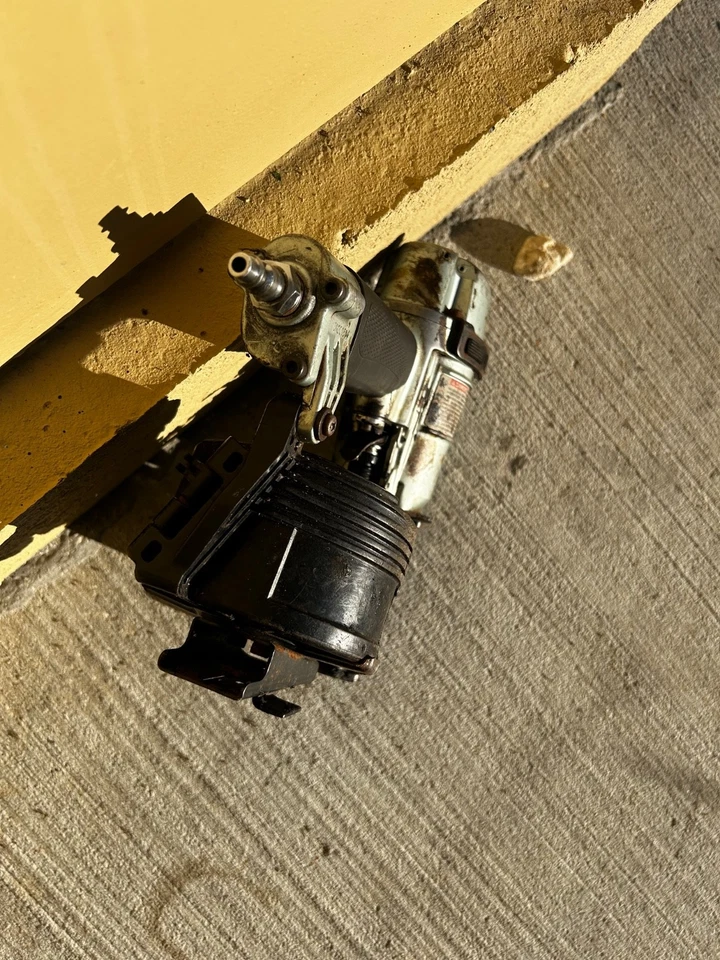 Hitachi Metabo HPT NV45AB2 1-3/4 Inch Coil Roofing Nailer - Working - Image 4 of 4