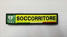 PATCH TOPPA SOCCORRITORE DAE - - - con strappo - - - 12 cm X 2,5 cm