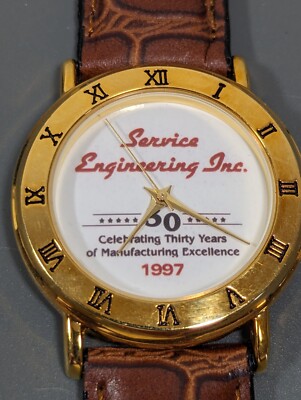 Vintage Service Engineering Inc 30 Years Gold Tone Brwon Band Watch