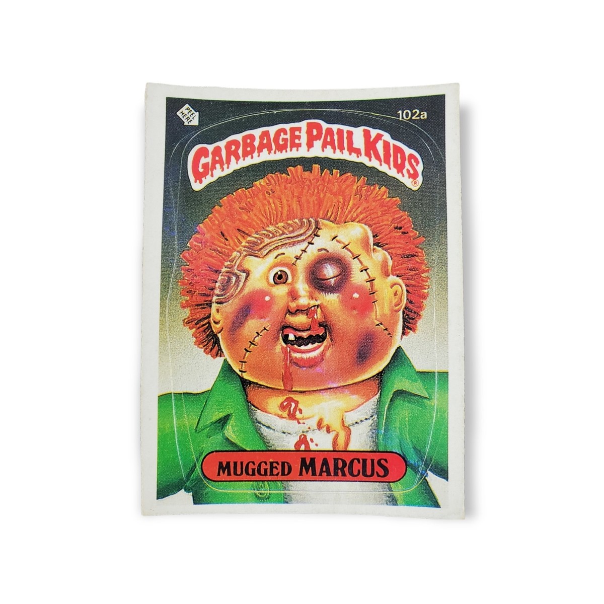 1986 Topps Garbage Pail Kids Series 3 #102a Mugged Marcus Die Cut
