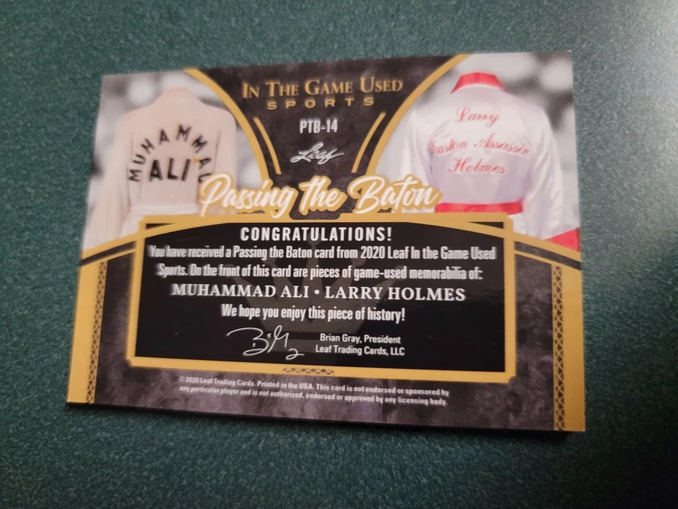MUHAMMAD ALI Larry Holmes JUEGO DE BOXEO USADO TARJETA RELIQUIA USADA #d30/35 2020 HOJA ITG Foto 2 de 3