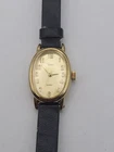 Vintage Timex Quartz Watch Women Gold Tone Oval Black Band Analog New Battery