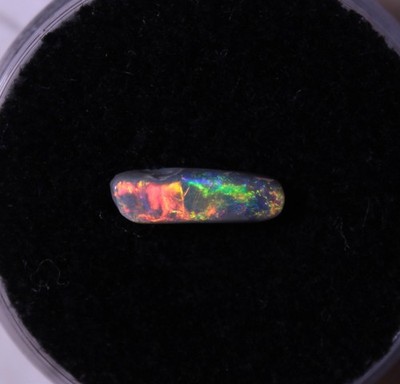 0.6ct solid Australian dark opal gem, bright red broad flash + floral