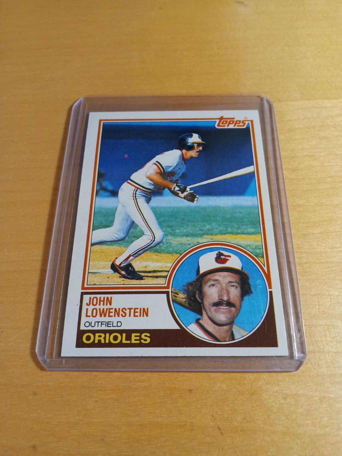 1983 Topps #473 JOHN LOWENSTEIN Baltimore Orioles Baseball Card, Outfield. (NM)