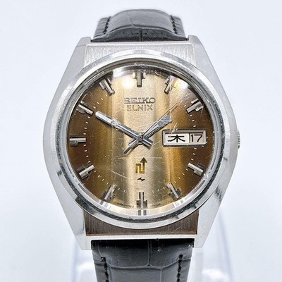 SEIKO ELNIX 0703-7090 1975 Electronic Balance Watch Brown Day Date