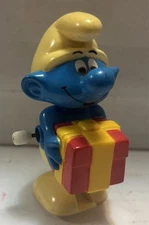 Vintage 1982 Smurf Wind-up Toy Jokey Holding Present Works Free Fast Shipping