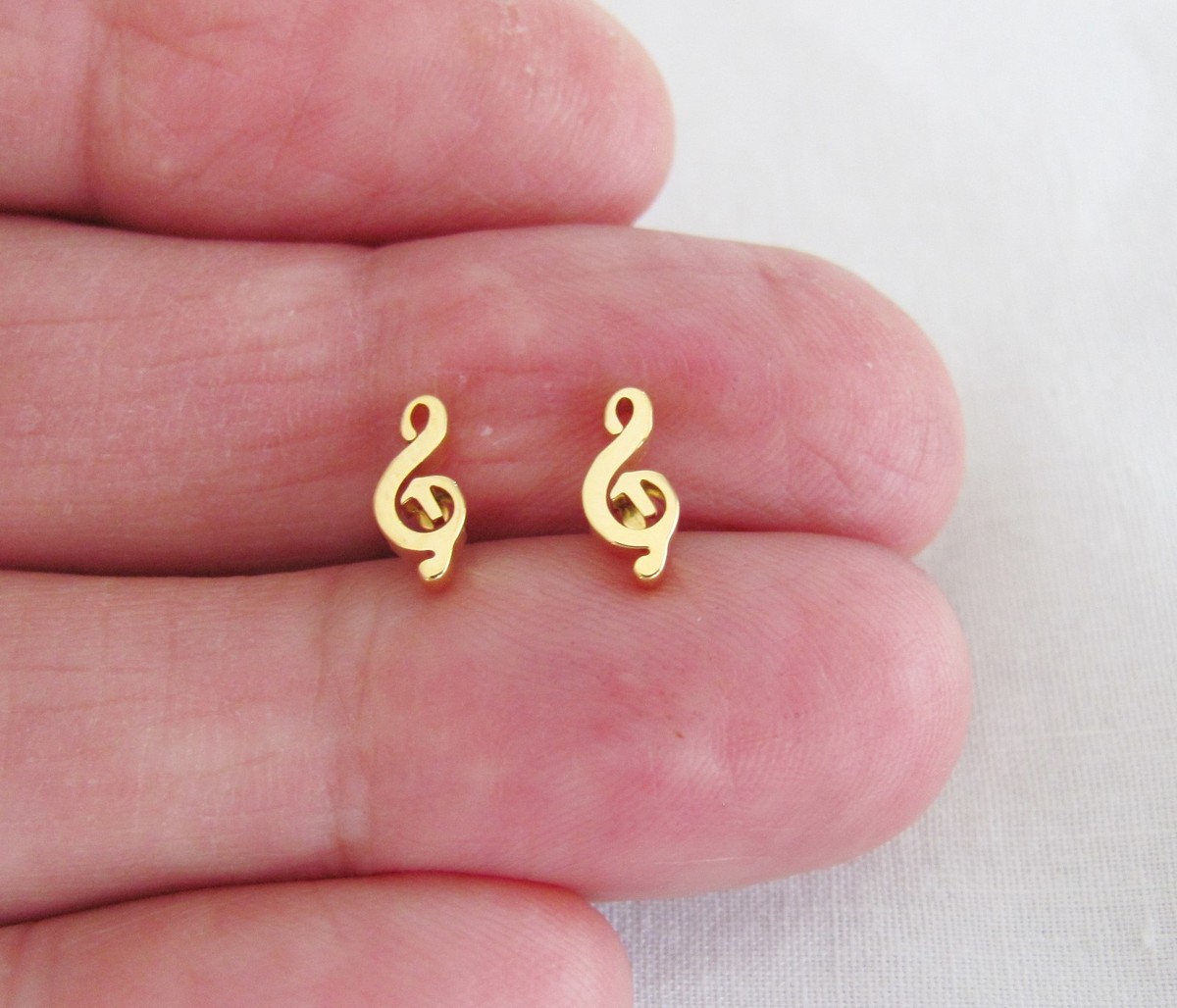 Stainless steel 9mm gold plated Music Clef stud earrings. | eBay